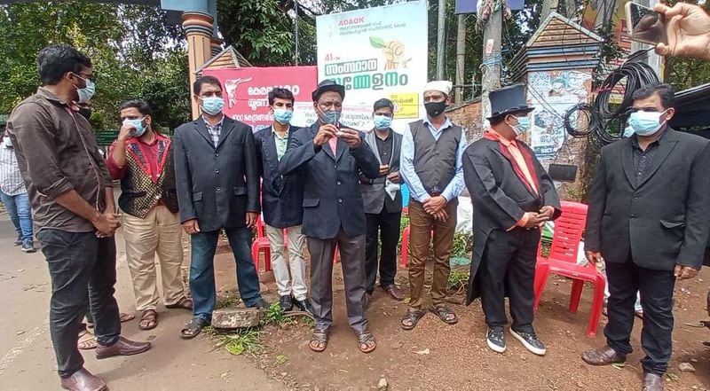 Magicians protest by burning tea on the head