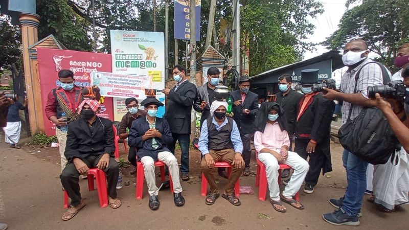 Magicians protest by burning tea on the head
