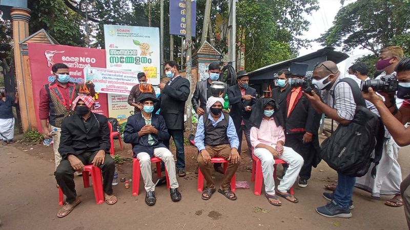 Magicians protest by burning tea on the head
