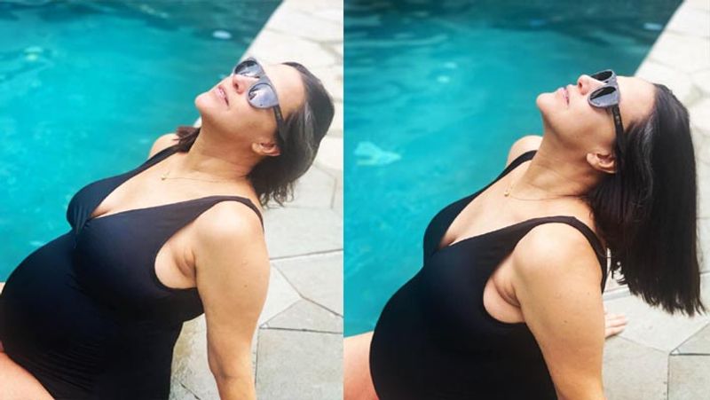 pregnant neha dhupia share pool side bikini photos flaunting baby bump
