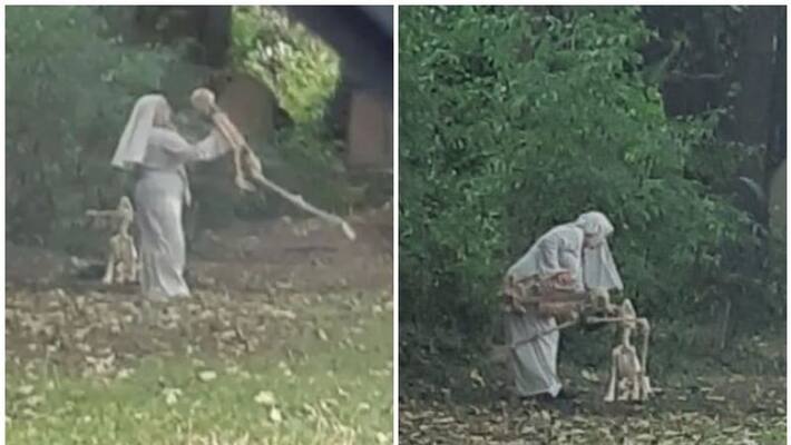 Woman Dressed As Nun Plays and Dances With Skeleton Woman Dressed As Nun Plays and Dances With Skeleton