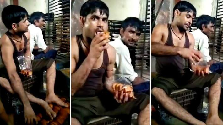 Factory workers lick and put feet on baked rusks before packing; video goes viral-tgy Factory workers lick and put feet on baked rusks before packing; video goes viral-tgy