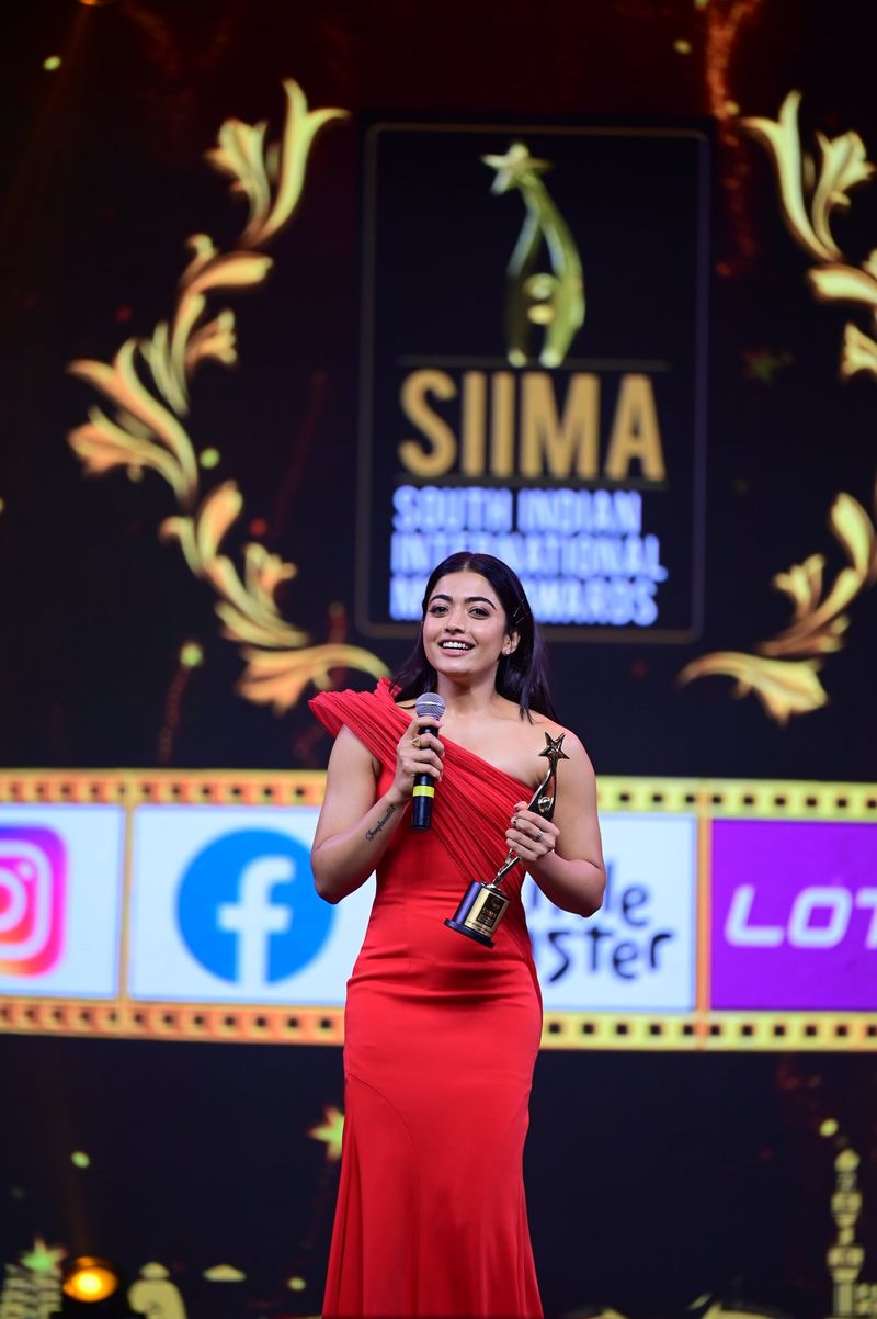 star heroin rashmika shines in siima 2021 awards she rises heat in red body con dress