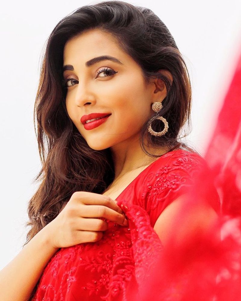 actress parvathy nair over load hot red saree photo shoot