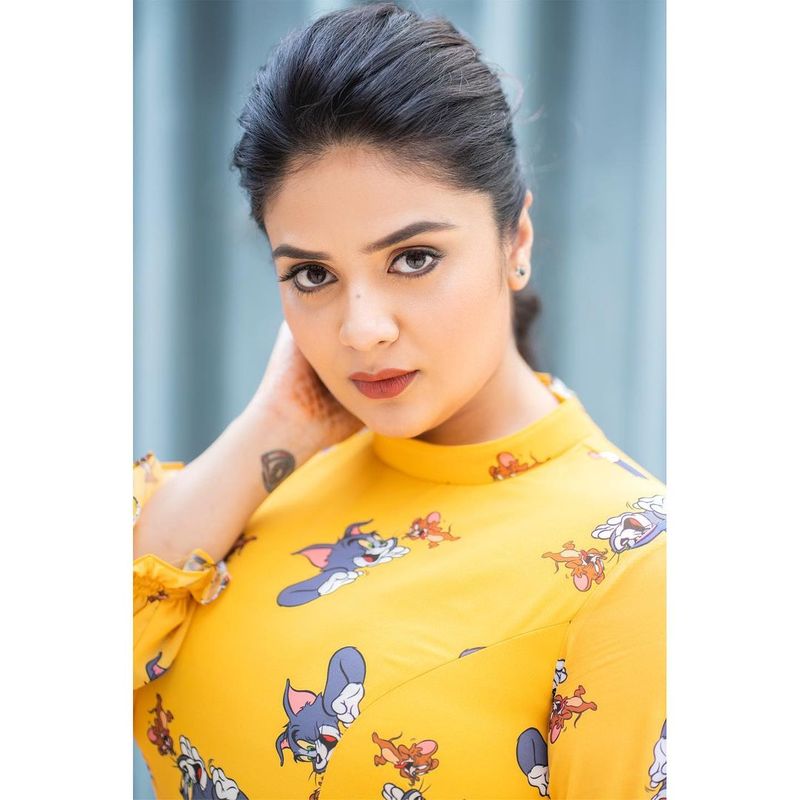 hot anchor sreemukhi grabs attention her latest photo shoot in short frack getting viral