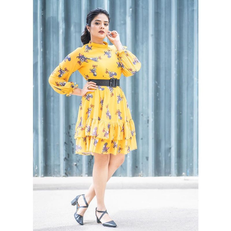 hot anchor sreemukhi grabs attention her latest photo shoot in short frack getting viral