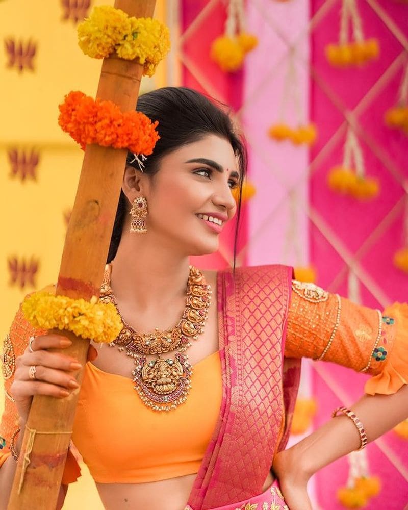 Jabardasth Varsha latest photos in Yellow dress are just stunning