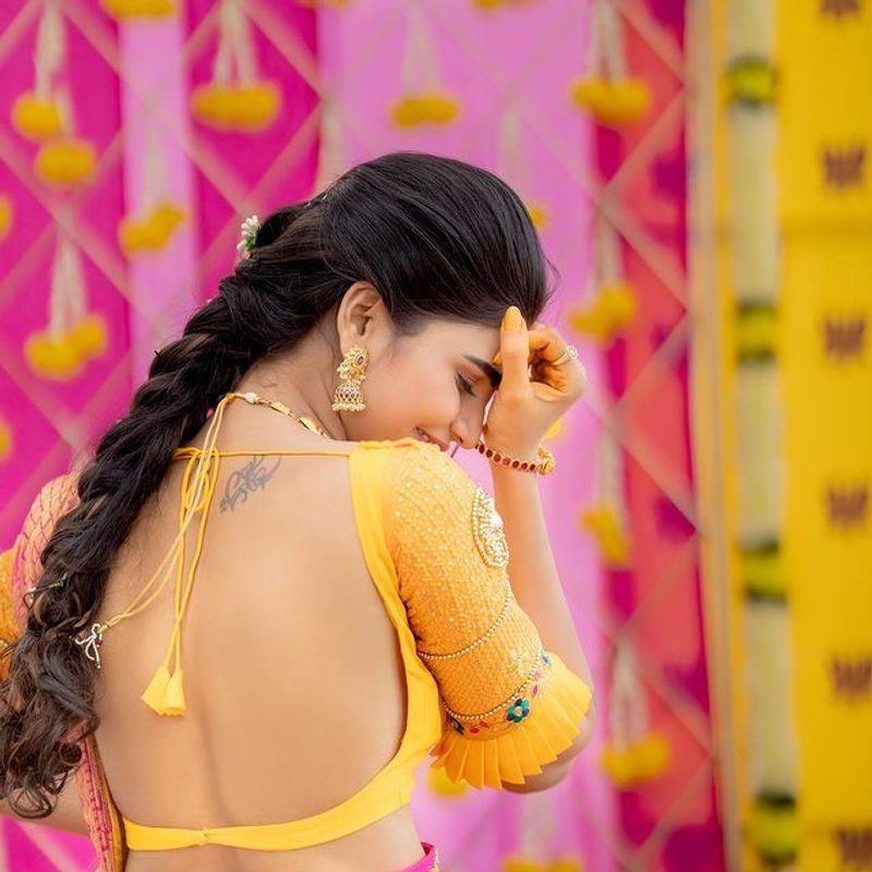 Jabardasth Varsha latest photos in Yellow dress are just stunning