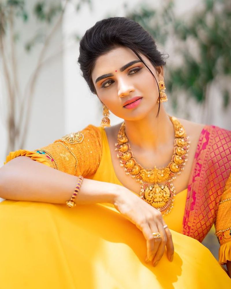 Jabardasth Varsha latest photos in Yellow dress are just stunning