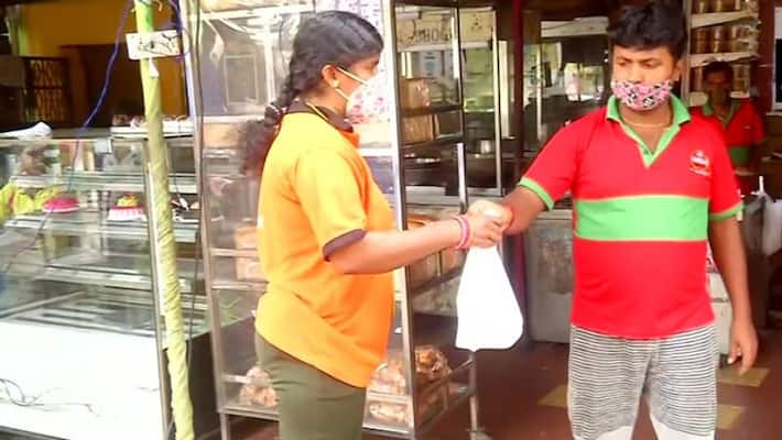 A nurse started working as a food delivery agent after losing her job due to the COVID pandemic A nurse started working as a food delivery agent after losing her job due to the COVID pandemic