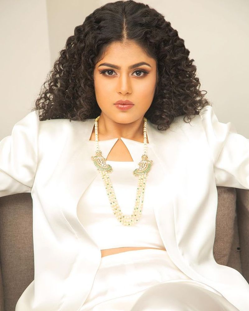 jathi ratnalu actress Faria Abdullah stunning poses in white dress