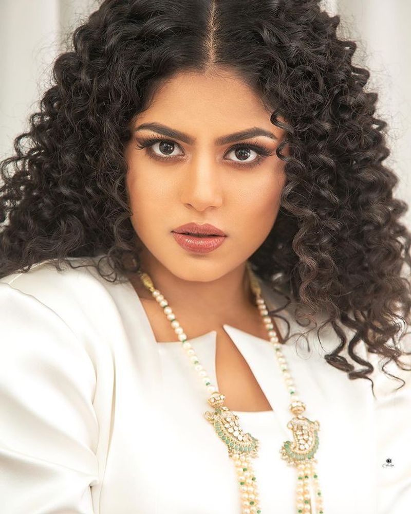 jathi ratnalu actress Faria Abdullah stunning poses in white dress