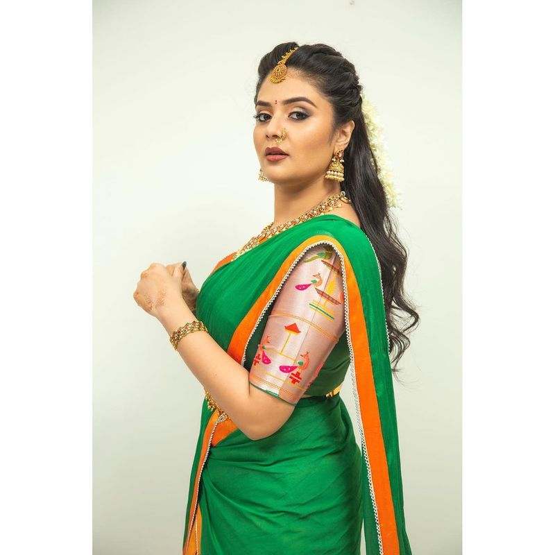anchor sreemukhi stuns in half saree but hotness never misses