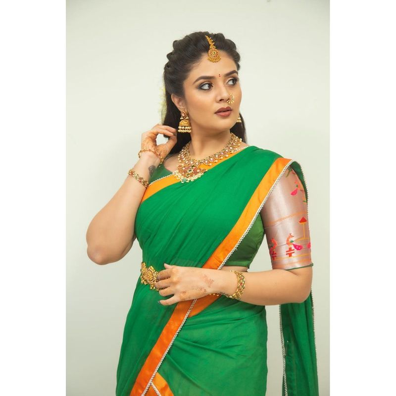 anchor sreemukhi stuns in half saree but hotness never misses