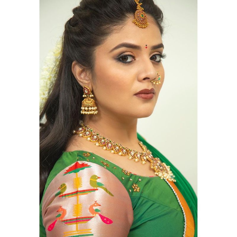anchor sreemukhi stuns in half saree but hotness never misses