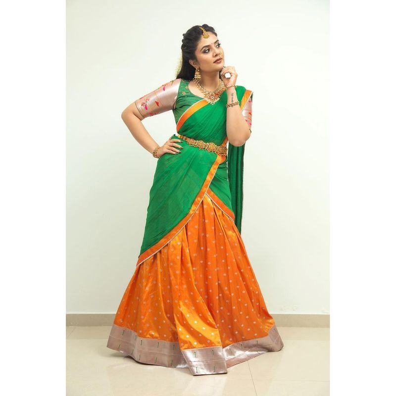 anchor sreemukhi stuns in half saree but hotness never misses