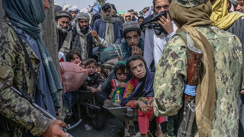 Taliban shot and hanged the body from a crane in Afghanistan