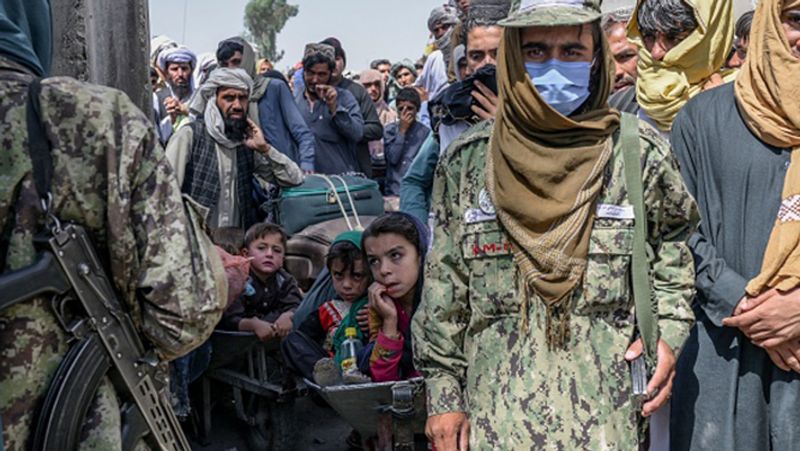 Taliban shot and hanged the body from a crane in Afghanistan