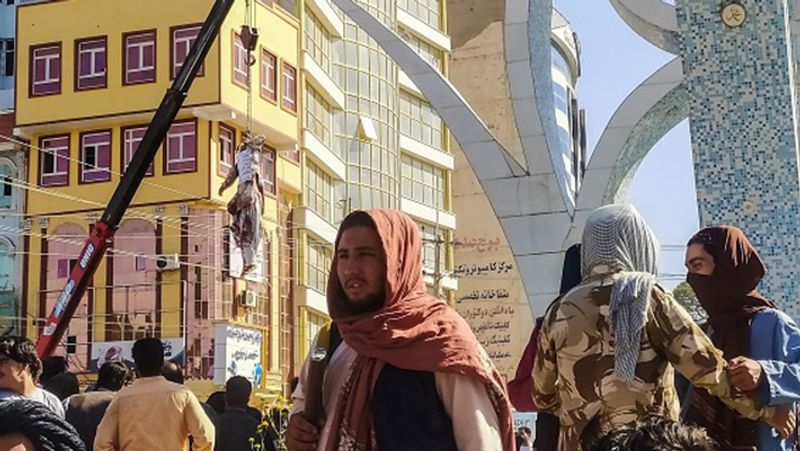 Taliban shot and hanged the body from a crane in Afghanistan