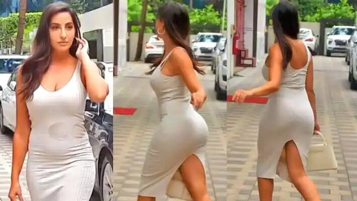 Nora Fatehi arrives at ED office, summoned in Rs 200 crore cheating case-SYT Nora Fatehi arrives at ED office, summoned in Rs 200 crore cheating case-SYT