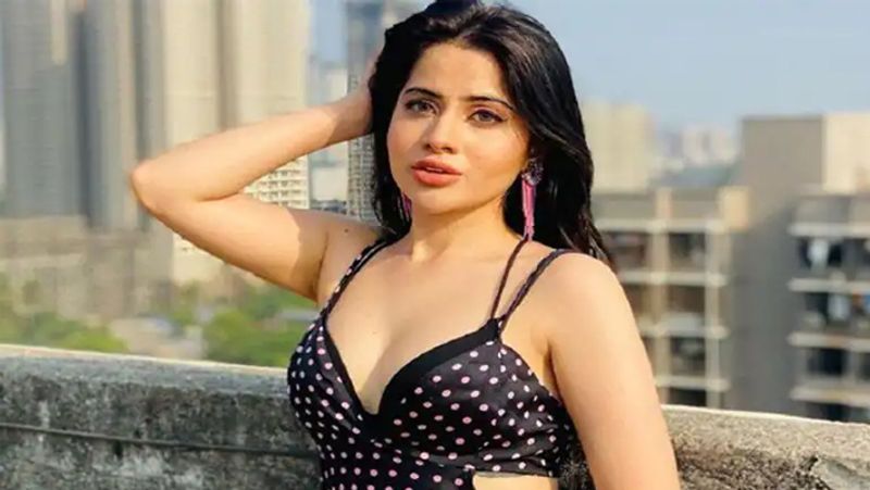 Bigg Boss contestant Urfi Javed gets trolled for her backless dress and showing spots on her back