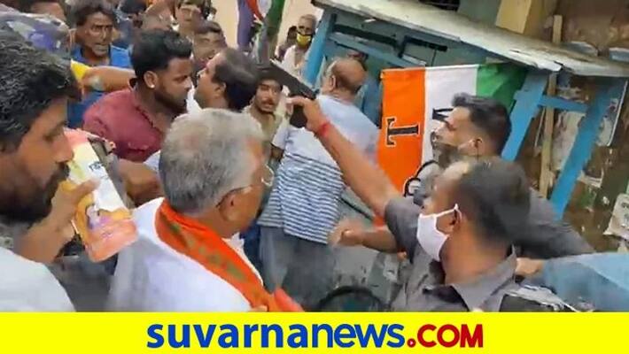Bhabanipur bypoll Ruckus during BJP campaign Dilip Ghosh security men pull out guns pod Bhabanipur bypoll Ruckus during BJP campaign Dilip Ghosh security men pull out guns pod