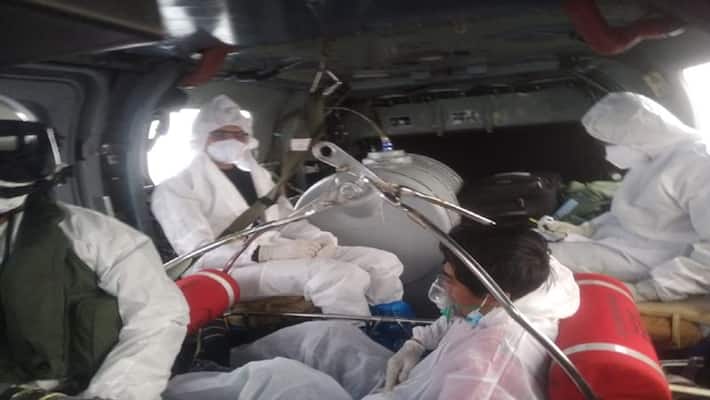 Indian Navy and Coast Guard of a Filipino sailor Mid Sea Medical Evacuation for helping a officer who was in deteriorating condition and need medical help Indian Navy and Coast Guard of a Filipino sailor Mid Sea Medical Evacuation for helping a officer who was in deteriorating condition and need medical help