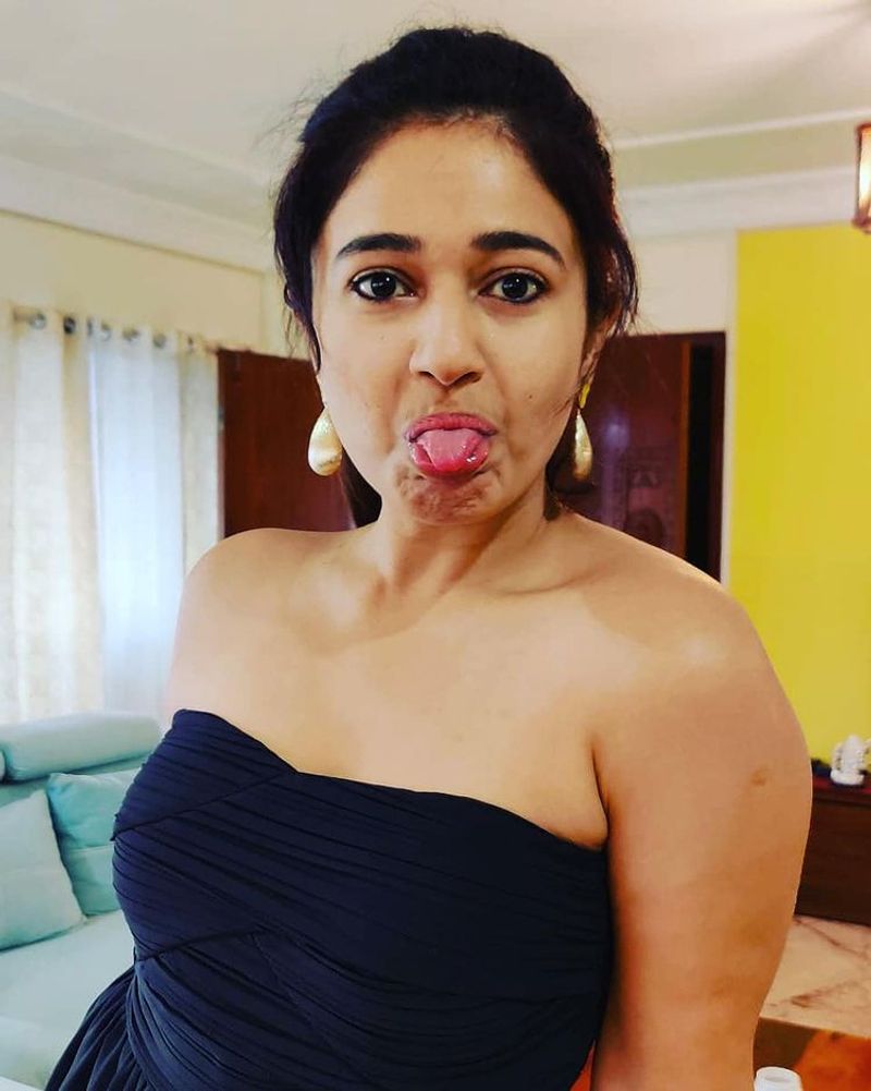 Actress Poonam Bajwa showing full legs in a black bikini hot photos