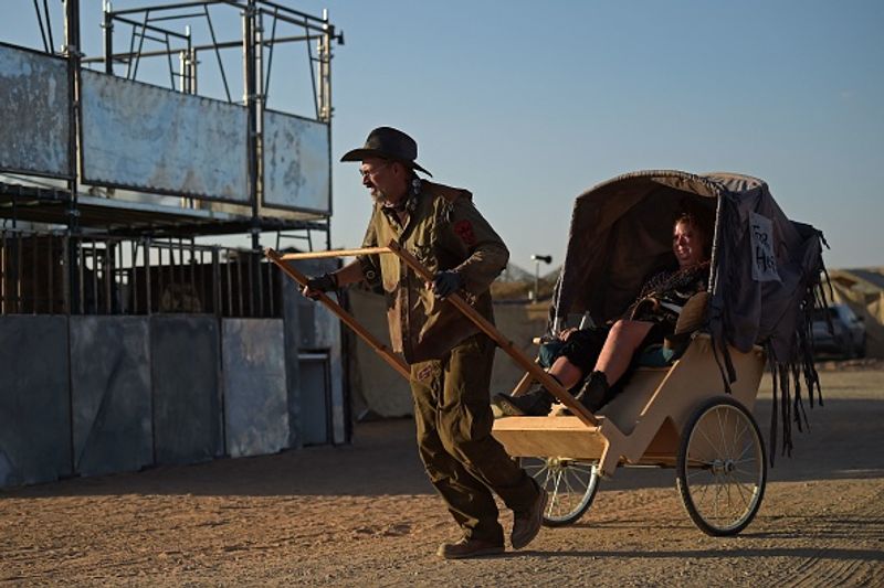 Celebration by thousands of Mad Max fans in Mojave Desert