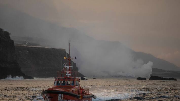 Canaries volcano lava reaches sea Canaries volcano lava reaches sea