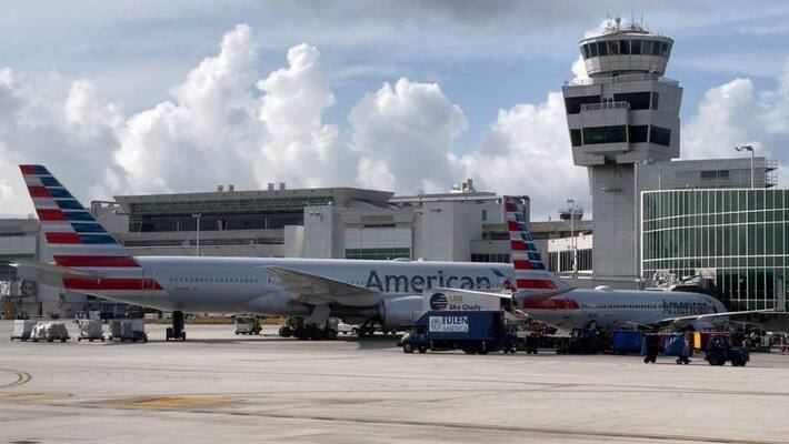 passenger walked on the wing of a plane after it landed passenger walked on the wing of a plane after it landed