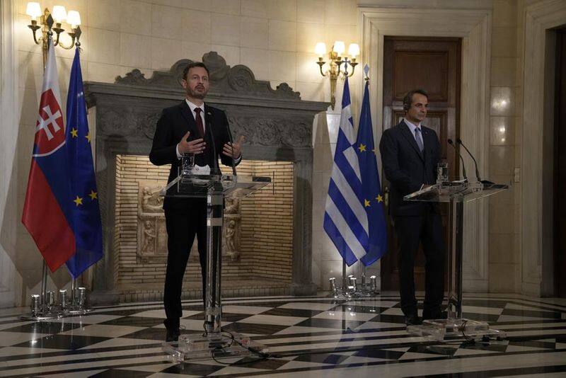 Greek PMs pet dog interrupts his news conference