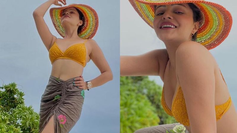 rubina dilaik flaunts her curves in red bikini actress enjoying vacation with husband in Maldives