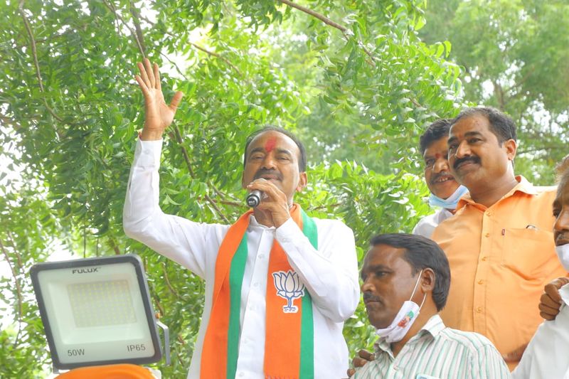 huzurabad bypoll... jammikunta trs ex president joins bjp presence of eatala