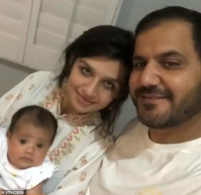 iconic photo baby lifted over wall at Kabul airport by Marine