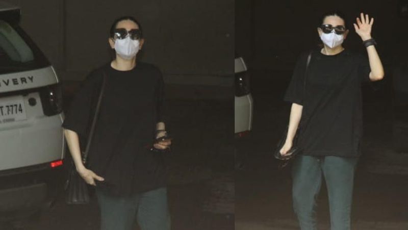 malaika arora spotted without and white spot on face outside appartment