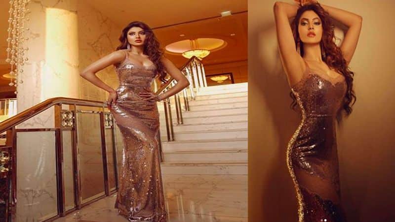 Urvashi Rautela shared stunning pictures in a golden dress Watch Hot Style