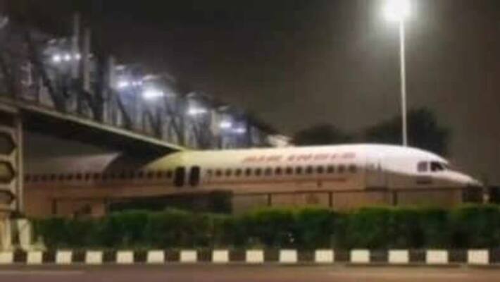 Viral Video: Air India Plane Gets Stuck Under Bridge Near Delhi Airport Viral Video: Air India Plane Gets Stuck Under Bridge Near Delhi Airport