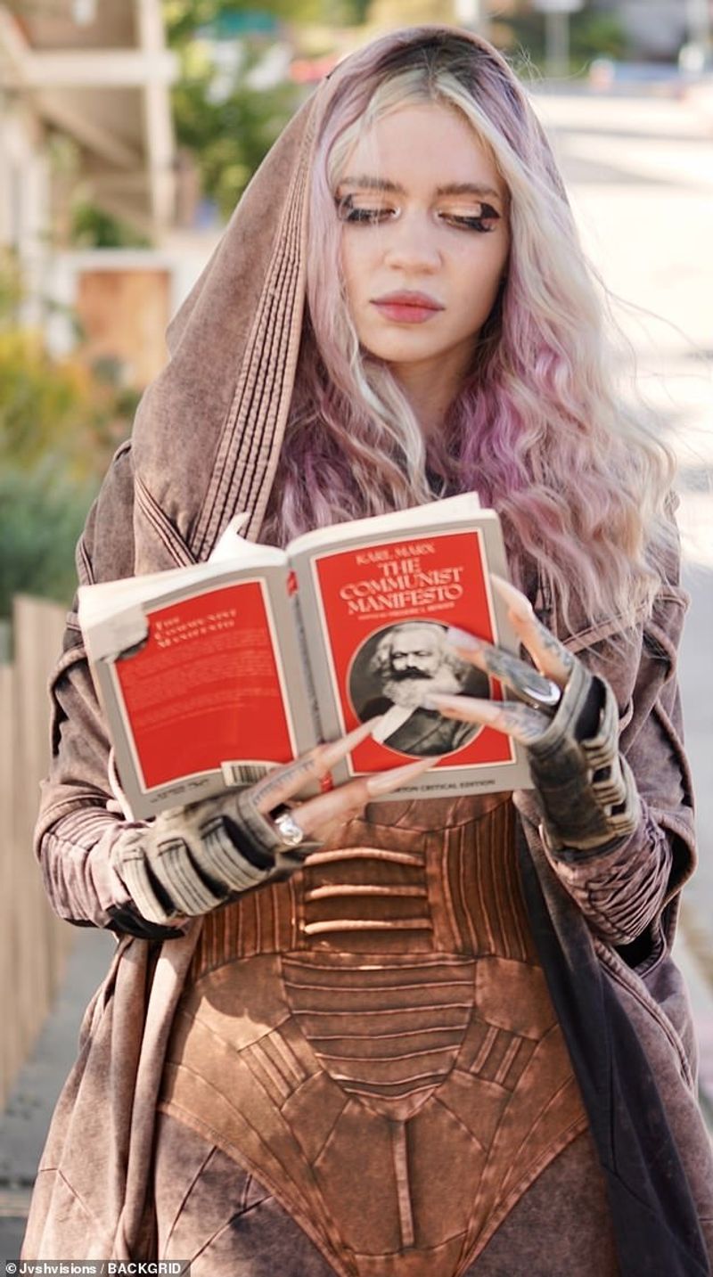 Karl Maxs Communist Manifesto was taken by Grimes after she divorce from elon musk