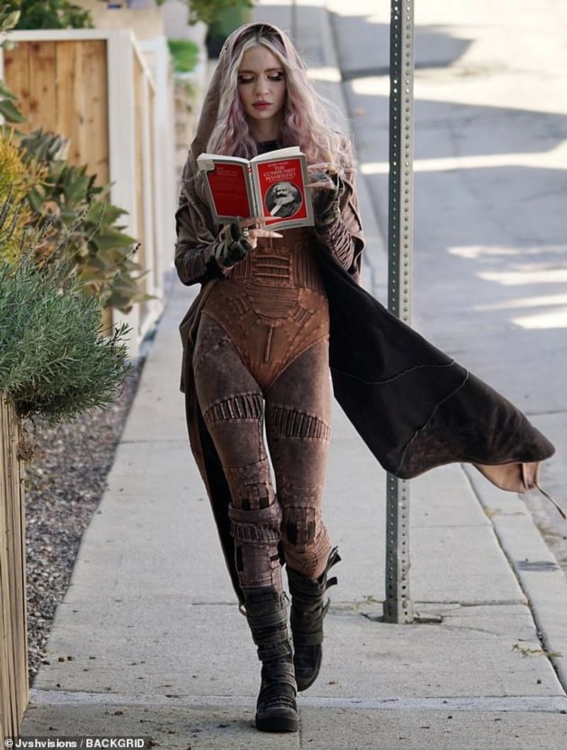 Karl Maxs Communist Manifesto was taken by Grimes after she divorce from elon musk