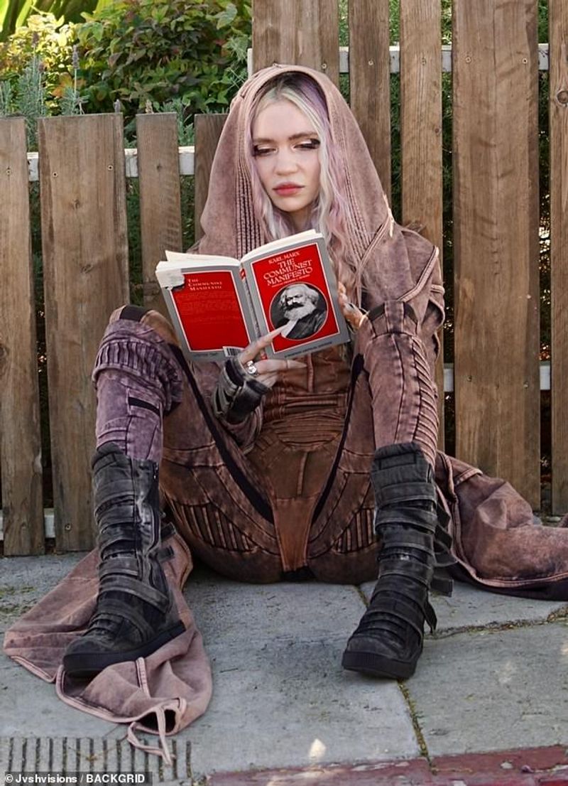 Karl Maxs Communist Manifesto was taken by Grimes after she divorce from elon musk
