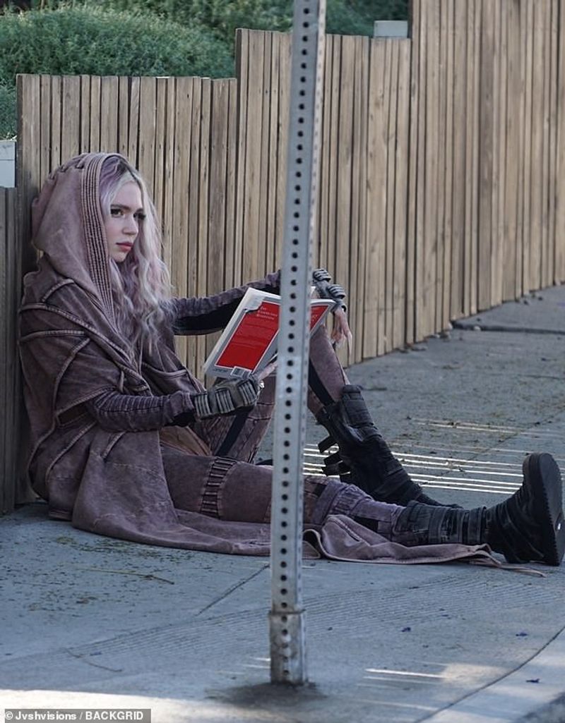 Karl Maxs Communist Manifesto was taken by Grimes after she divorce from elon musk
