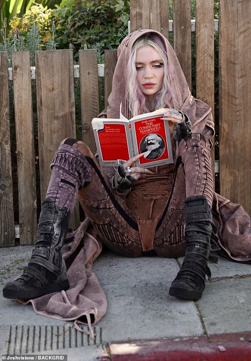 Karl Maxs Communist Manifesto was taken by Grimes after she divorce from elon musk