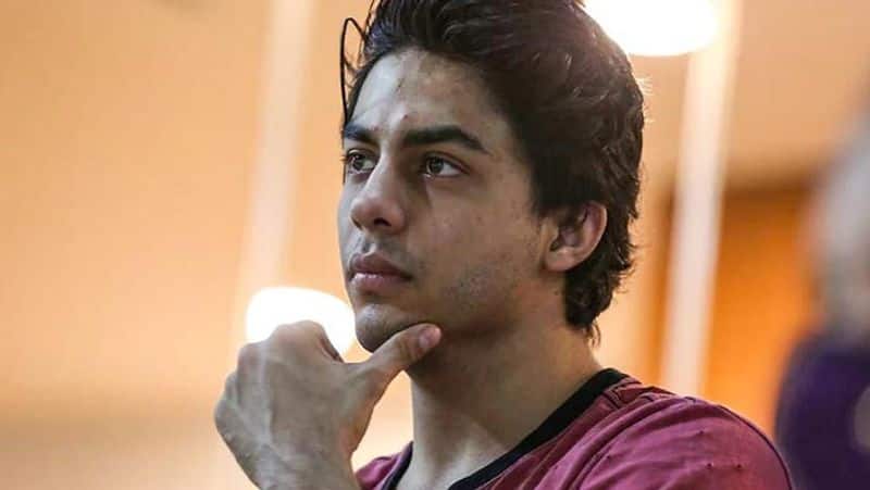 shahrukh khan son aryan khan having food like other accused in custody he is reading science books