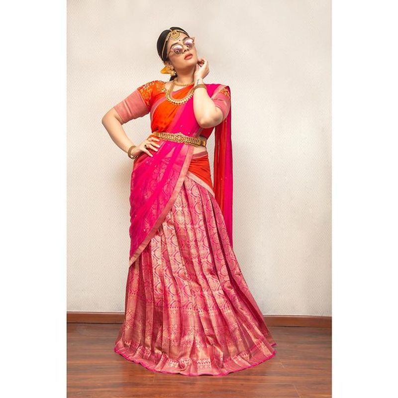 Sreemukhi Stylish photos in half saree, crazy looks in goggles