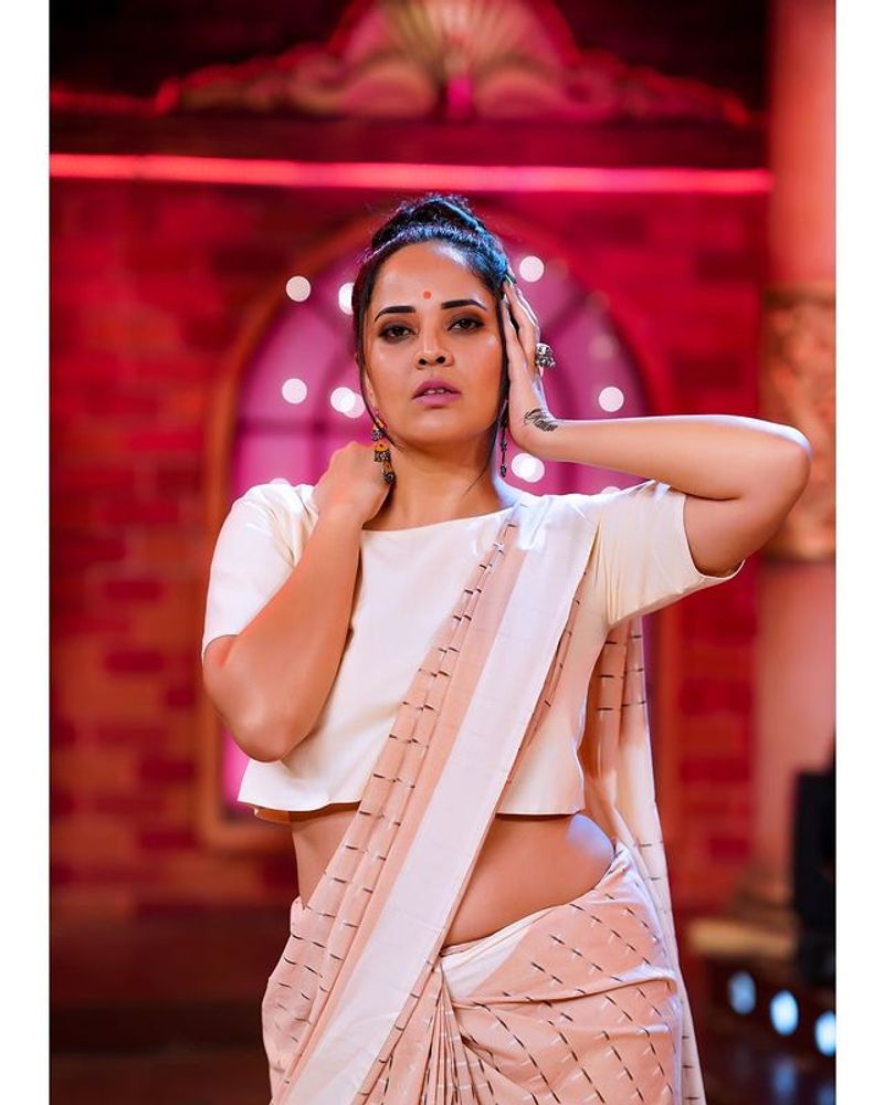 Anchor Anasuya hot show in latest saree photoshoot