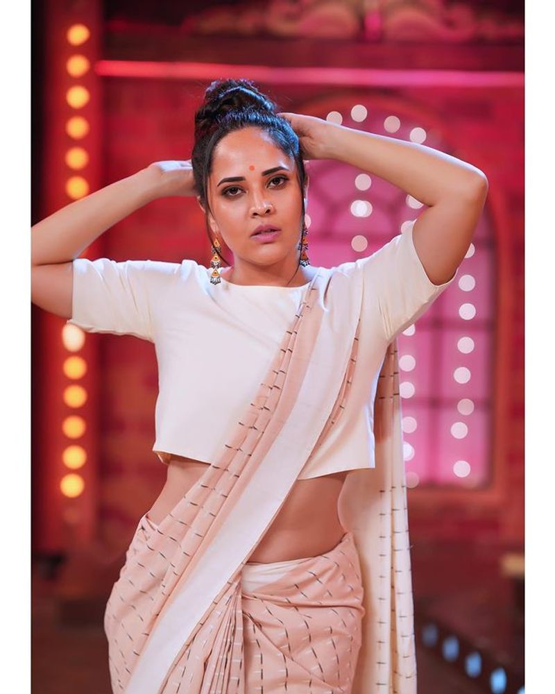 Anchor Anasuya hot show in latest saree photoshoot
