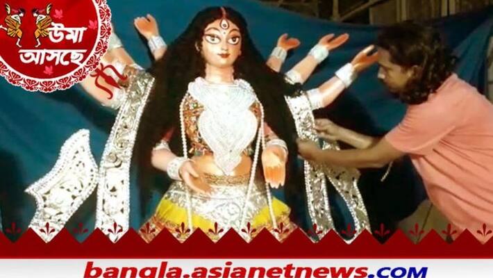Durga Idol is decorated with 32 kg silver jewelery and Gujarati Khagra in Sodpur RTB Durga Idol is decorated with 32 kg silver jewelery and Gujarati Khagra in Sodpur RTB