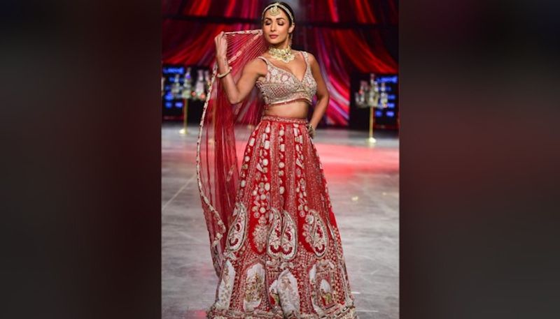 Bollywood actress Malaika Arora set the ramp on fire in red lahenga set in lakme fashion week BRD