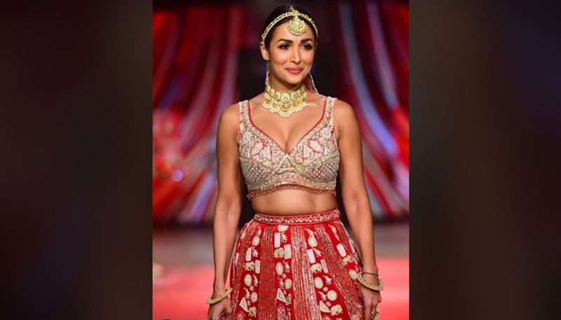 Bollywood actress Malaika Arora set the ramp on fire in red lahenga set in lakme fashion week BRD